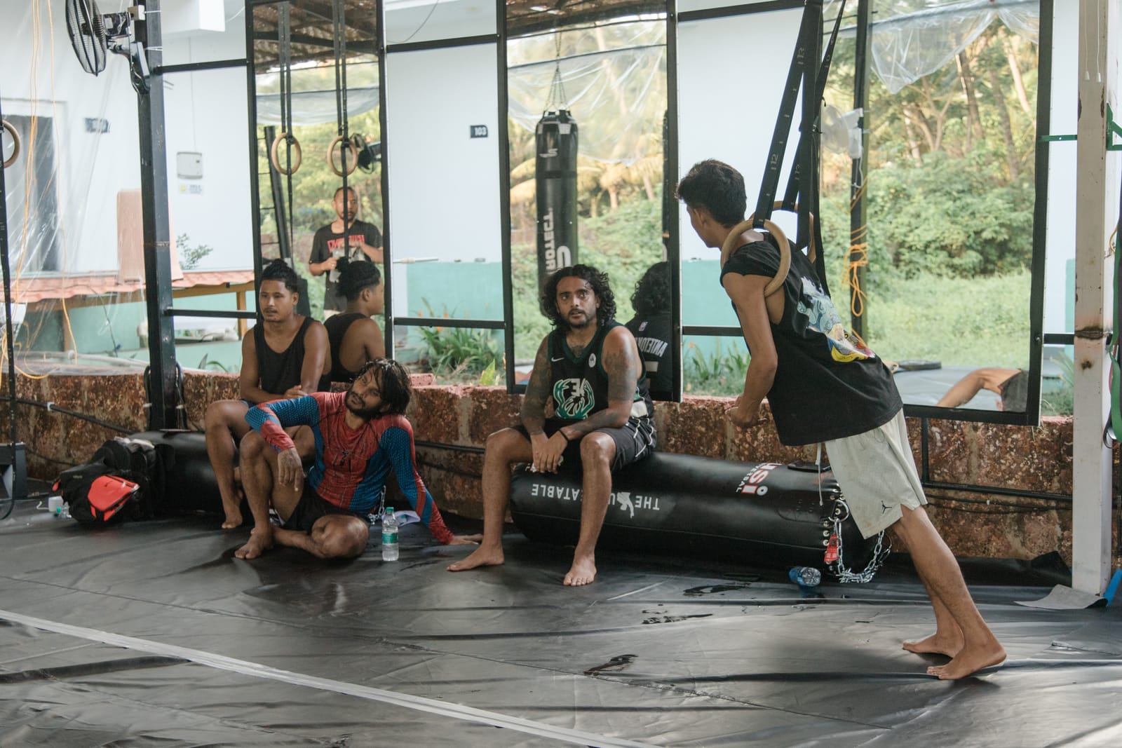 Kicking drills during a class on the mats at Gaia Fit Lab