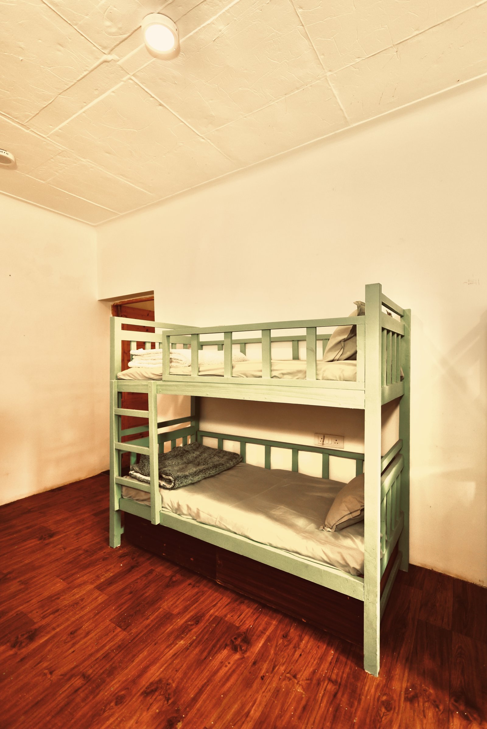 Dorm bunks at Home of Gaia hostel, Morjim